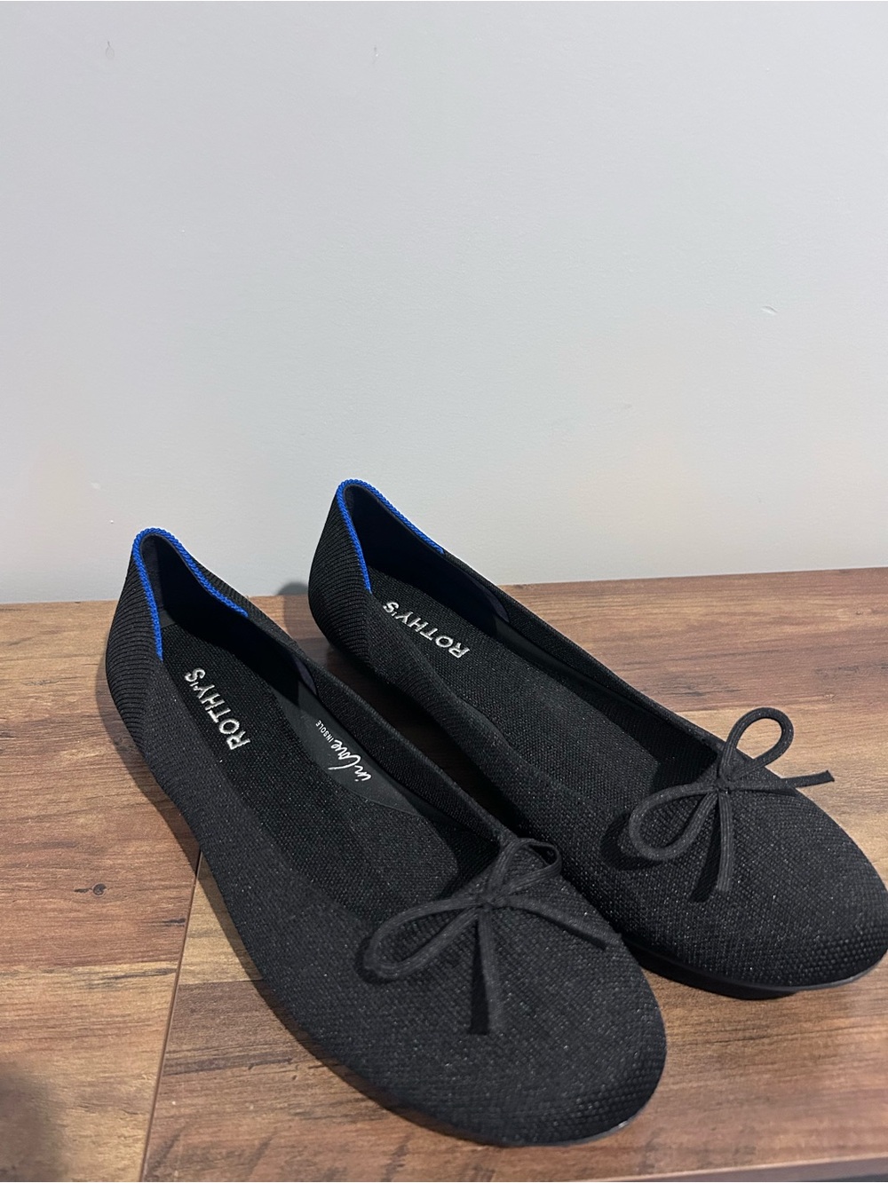 Rothy's Black Ballet Flats with Blue Trim
